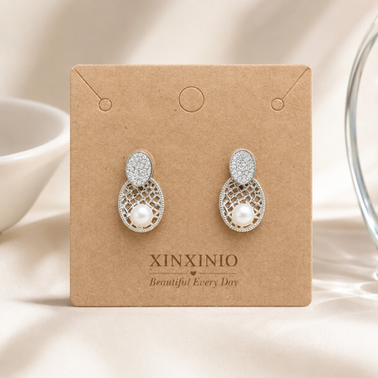 「XINXINIO」上品パール×きらめきストーンのオーバルピアス 大人可愛いシルバーデザイン 華やか オーバル パーティー 結婚式 プレゼント